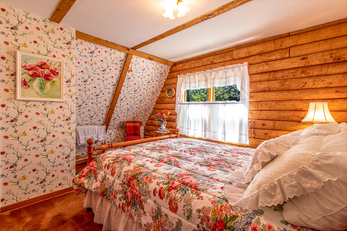 53174 Walters Drive Idyllwild, CA 92549 - Photo 13 of 55 a bedroom with a bed and a window