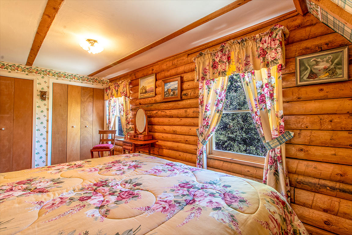 53174 Walters Drive Idyllwild, CA 92549 - Photo 46 of 55 a bedroom with a bed and a window