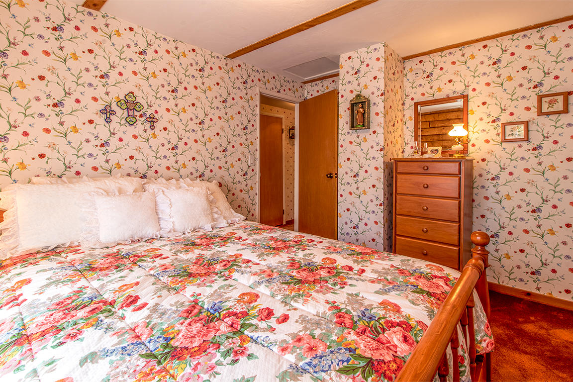 53174 Walters Drive Idyllwild, CA 92549 - Photo 47 of 55 a bedroom with a bed and a cabinets