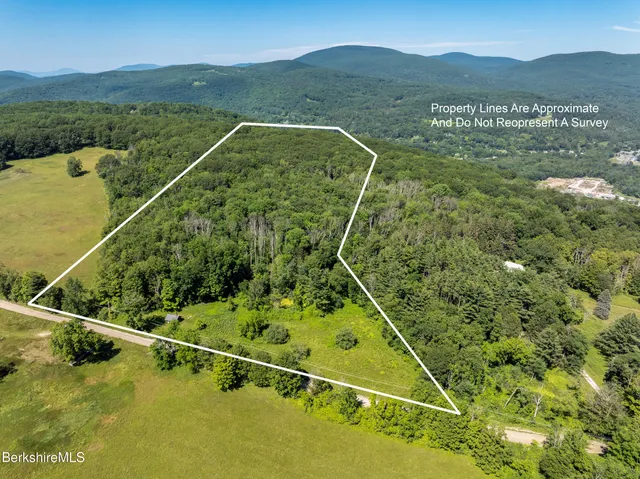 a view of a swimming pool with a balcony
