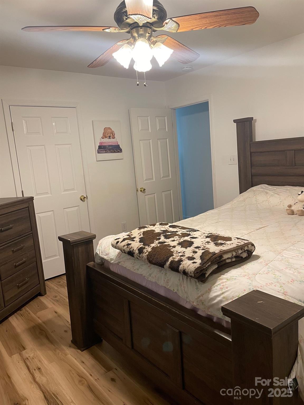 705 Sagrada Drive York, SC 29745 - Photo 17 of 26 a bedroom with a bed and a dresser