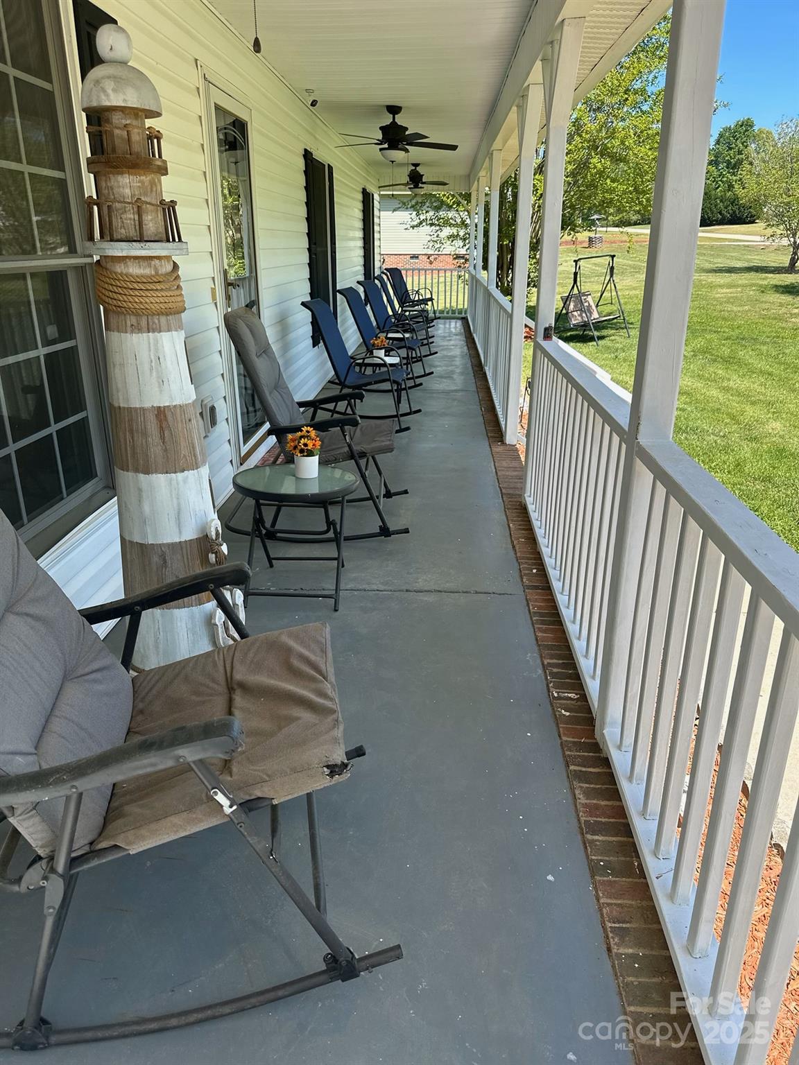 705 Sagrada Drive York, SC 29745 - Photo 5 of 26 a living room with furniture and a floor to ceiling window