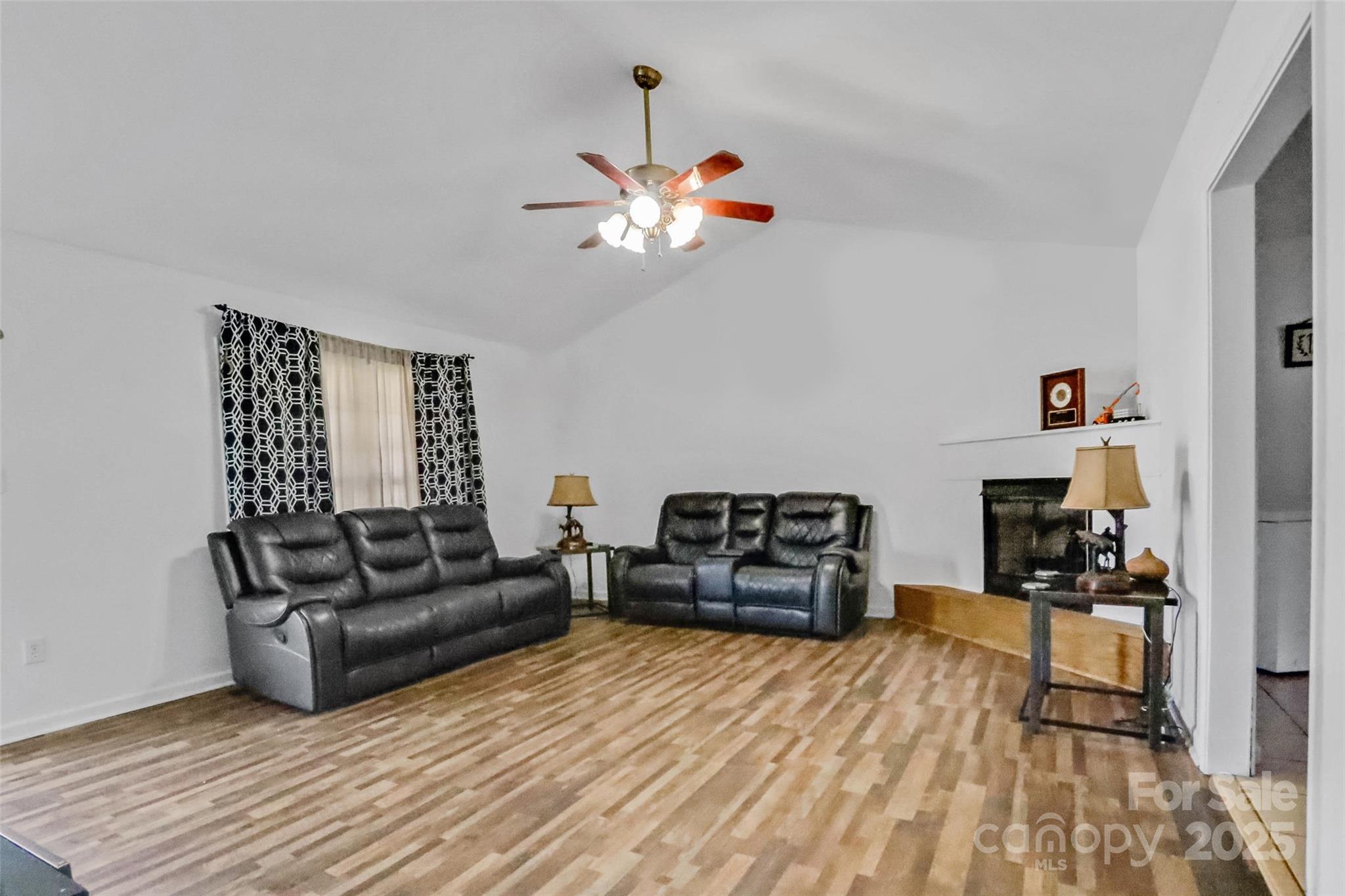 705 Sagrada Drive York, SC 29745 - Photo 6 of 26 a living room with furniture and wooden floor