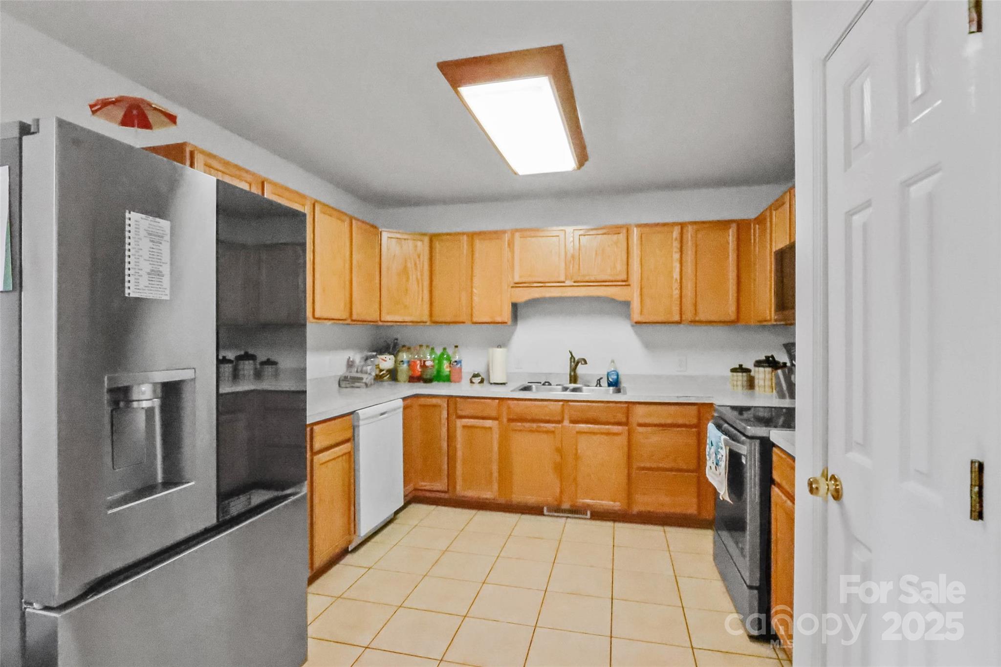 705 Sagrada Drive York, SC 29745 - Photo 10 of 26 a kitchen with stainless steel appliances granite countertop a refrigerator sink and cabinets