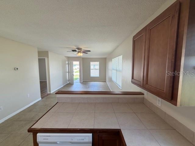11089 Pendleton Avenue, Unit B Englewood, FL 34224 - Photo 12 of 19 a view of kitchen with cabinets