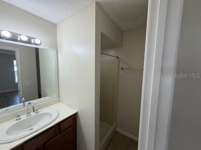 11089 Pendleton Avenue, Unit B Englewood, FL 34224 - Photo 10 of 19 a bathroom with a sink and a mirror