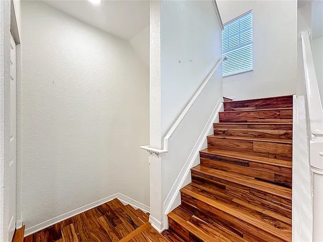 a view of a swimming pool and a yard