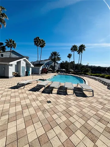 an aerial view of a house with outdoor space