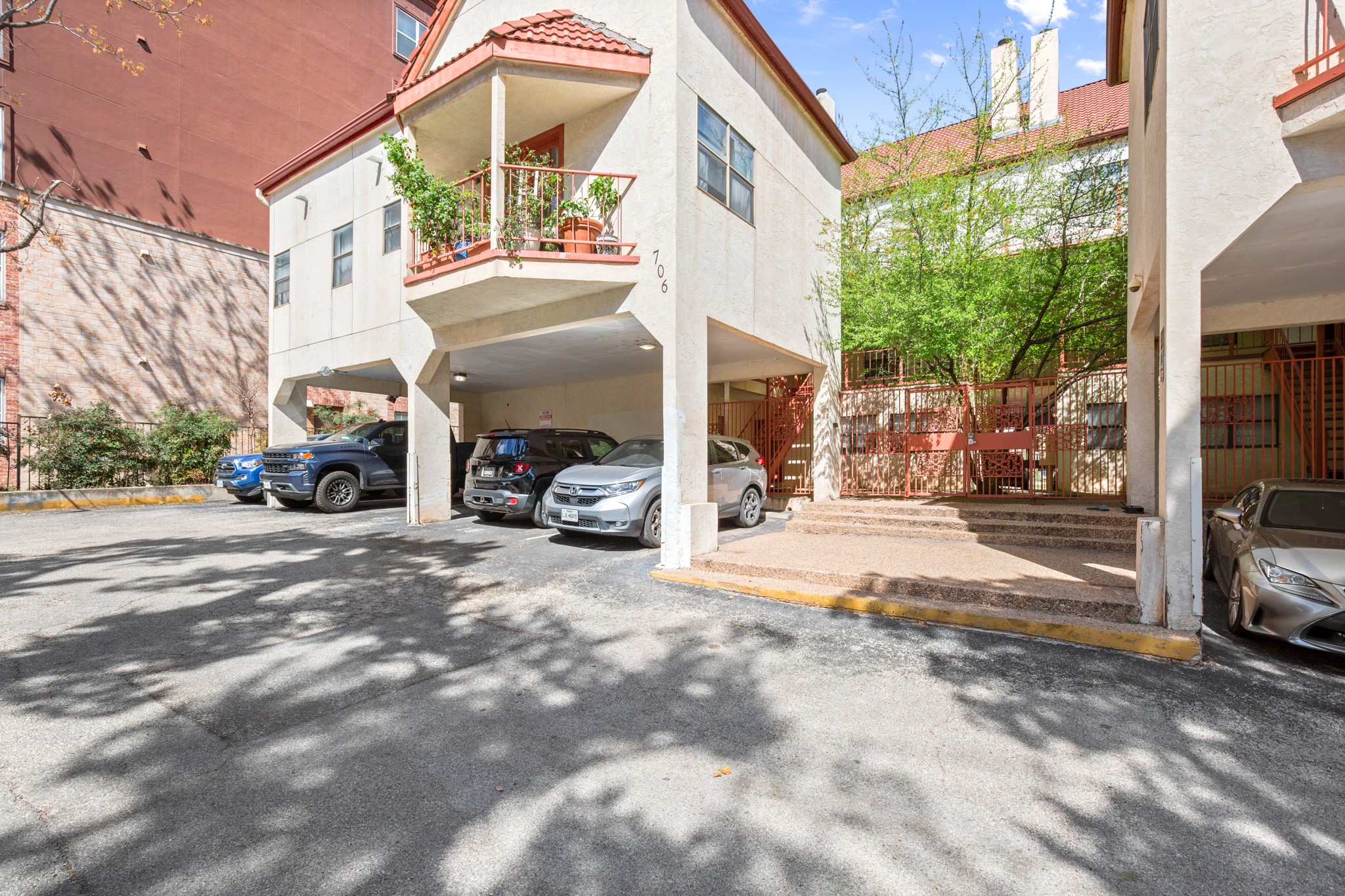 706 West 22nd Street, Unit 206 Austin, TX 78705 - Photo 17 of 18 View of covered parking lot