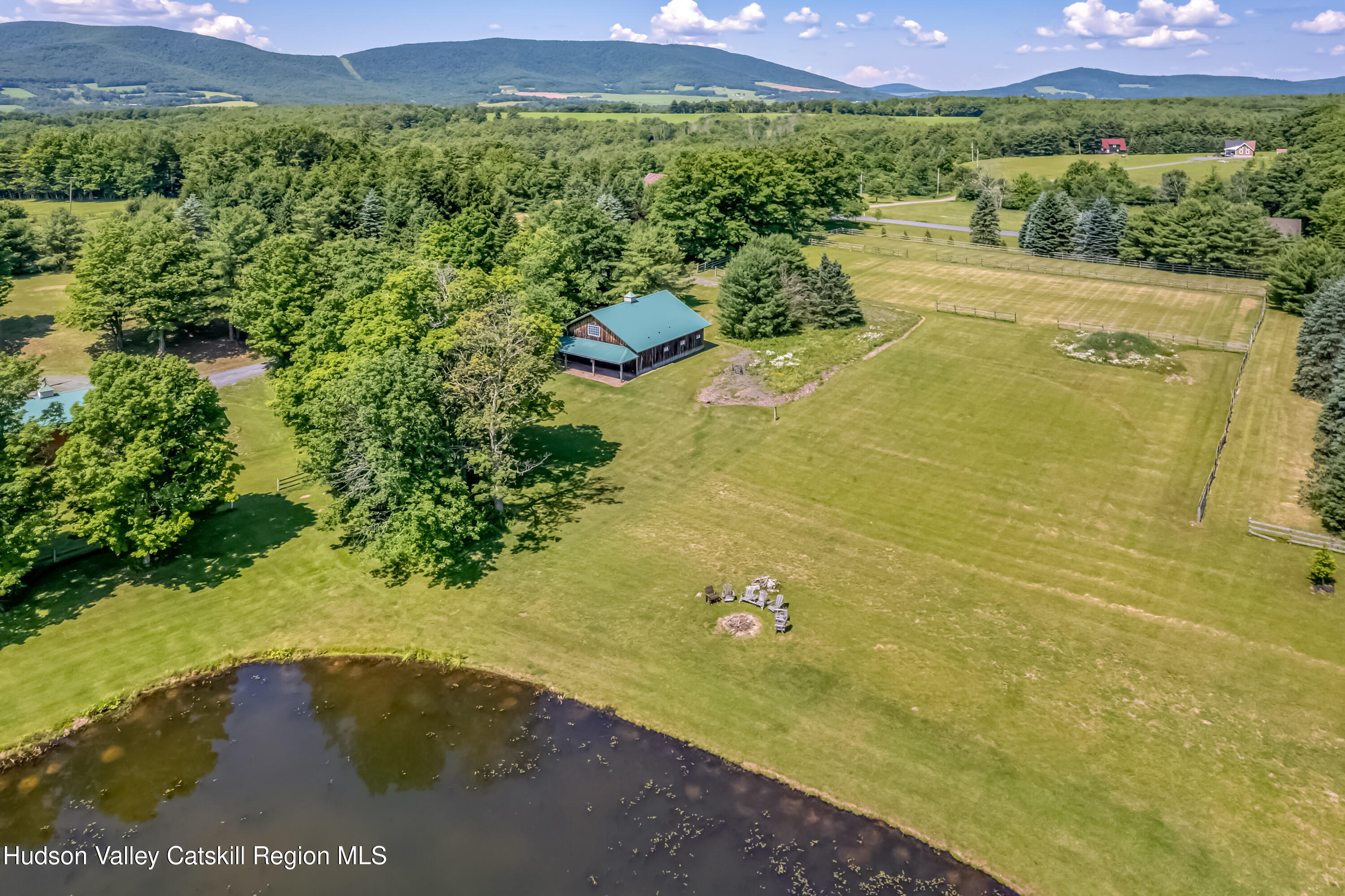 688 Bruce Porn Road Gilboa, NY 12167 - Photo 30 of 104 a view of a lake with a mountain in the background