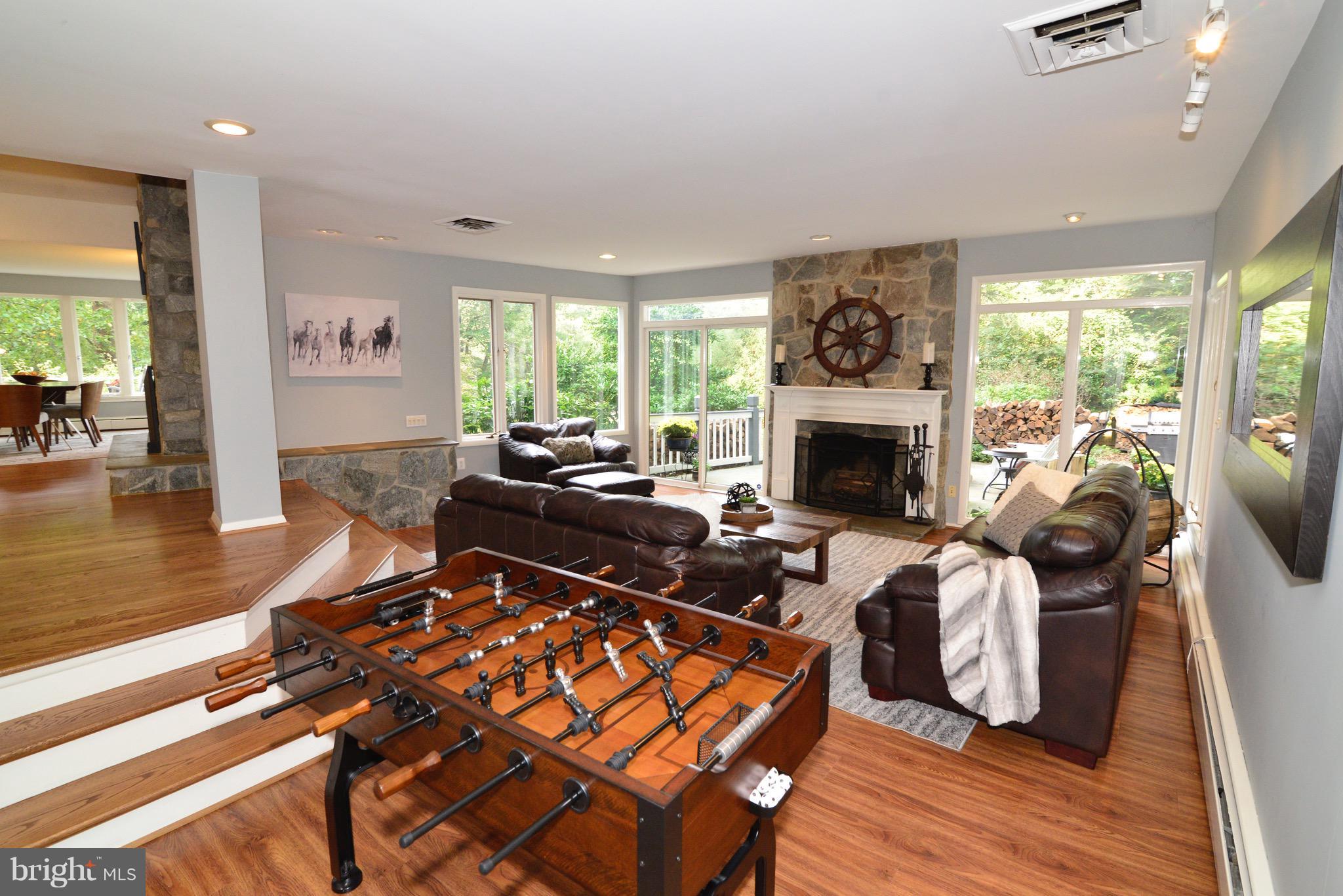 9944 Lawyers Road Vienna, VA 22181 - Photo 5 of 30 Enjoy relaxing in front of the stone fireplace