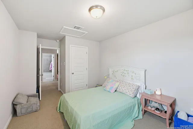 a house view with a garden and outdoor seating