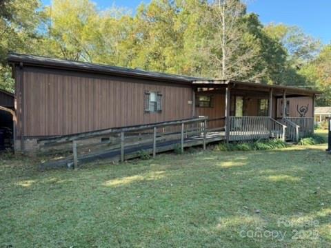 2622 Cimarron Circle Midland, NC 28107 - Photo 11 of 13 a backyard of a house with lots of green space