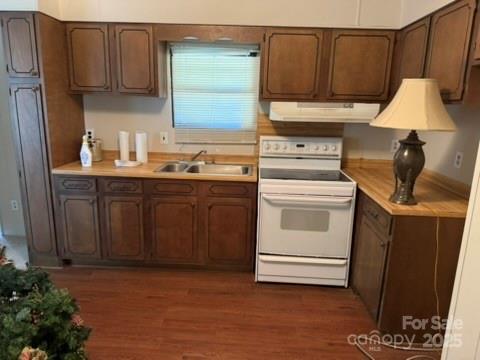 2622 Cimarron Circle Midland, NC 28107 - Photo 4 of 13 a kitchen with a stove sink and cabinets