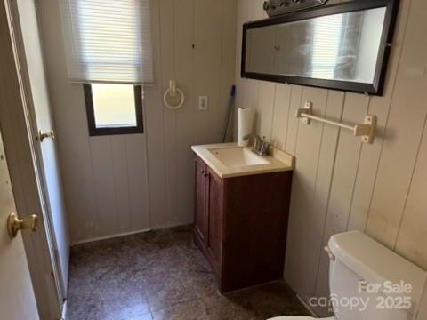 2622 Cimarron Circle Midland, NC 28107 - Photo 8 of 13 a bathroom with a sink toilet and mirror