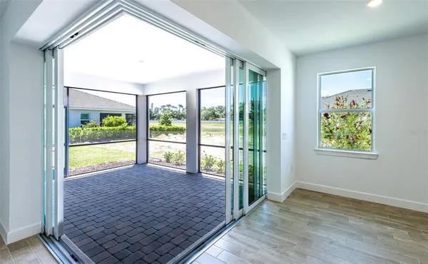 a view of an empty room and window