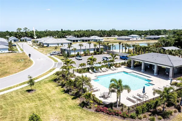 a view of a swimming pool and lake view