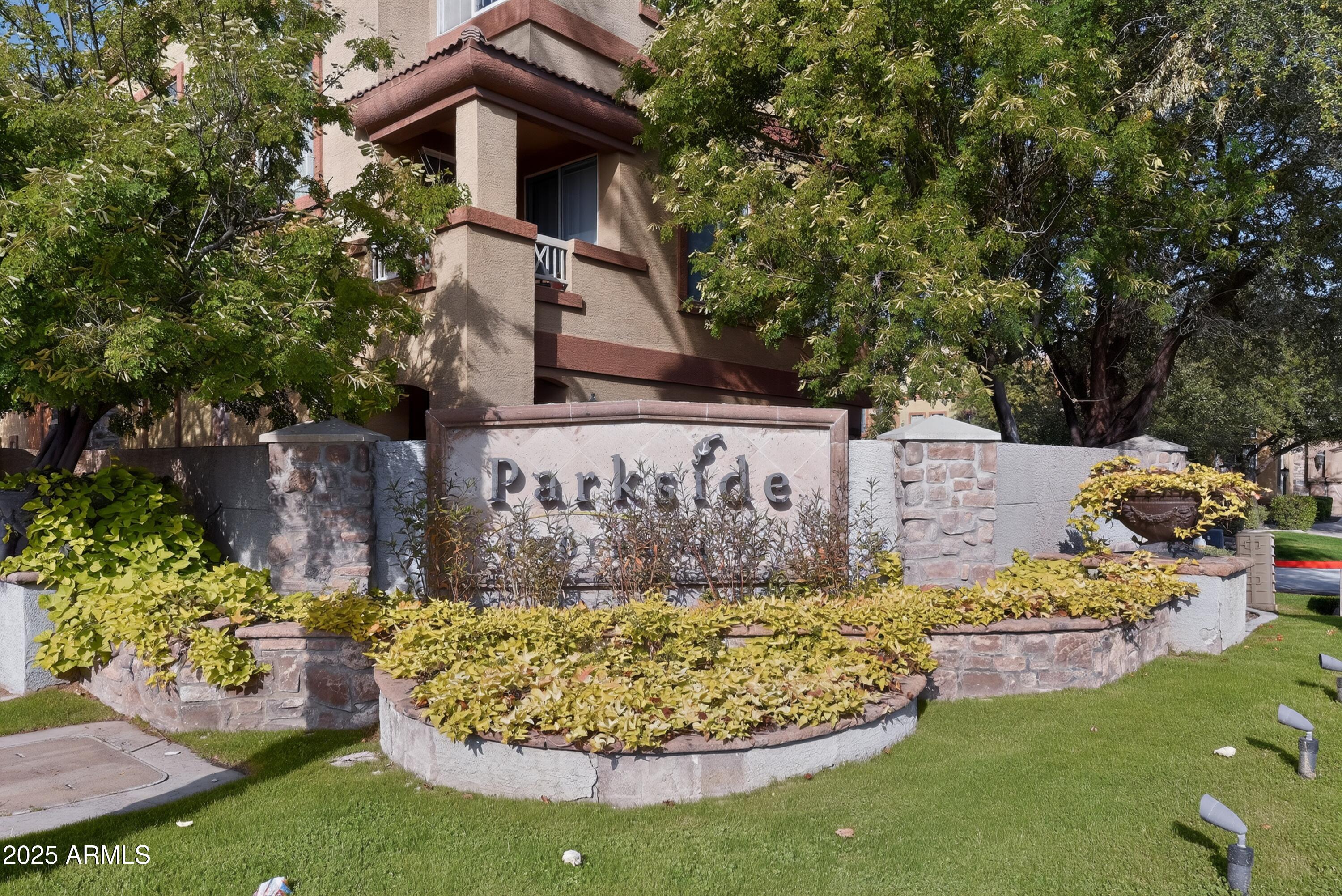 a view of a wooden house with a yard