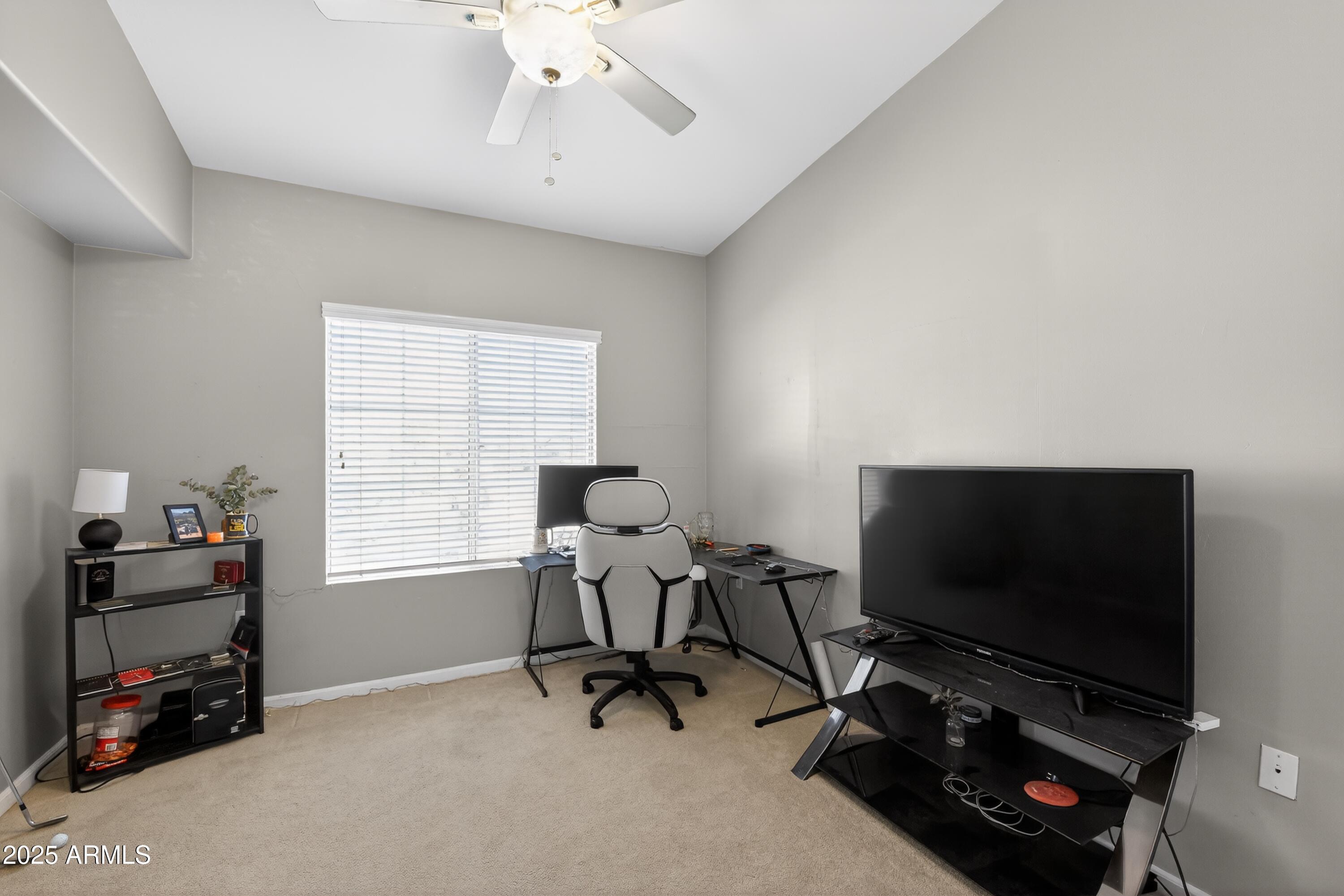 1920 East Bell Road, Unit 1079 Phoenix, AZ 85022 - Photo 27 of 29 a view of a workspace with furniture and a window