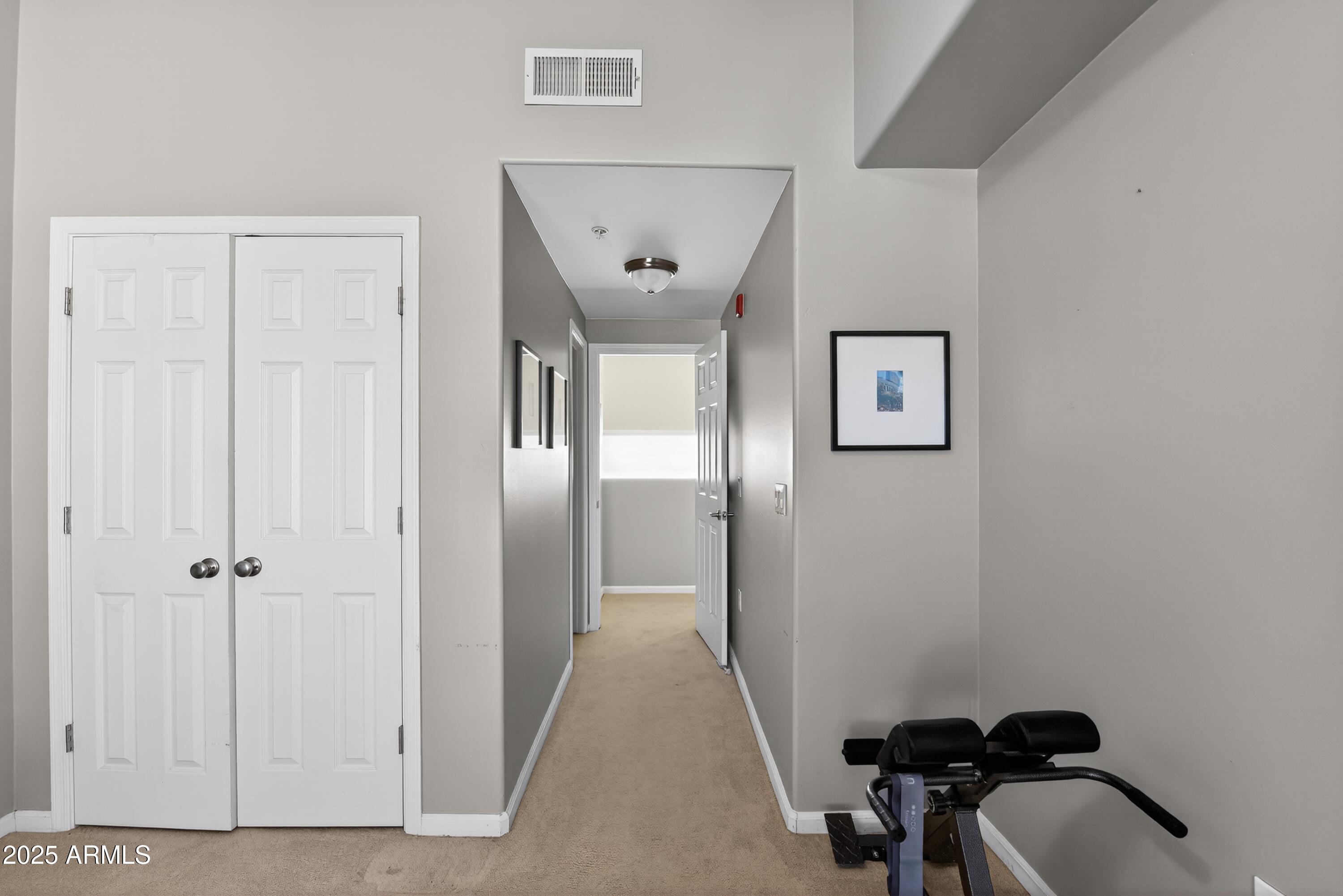 1920 East Bell Road, Unit 1079 Phoenix, AZ 85022 - Photo 28 of 29 a view of a room with a wardrobe space