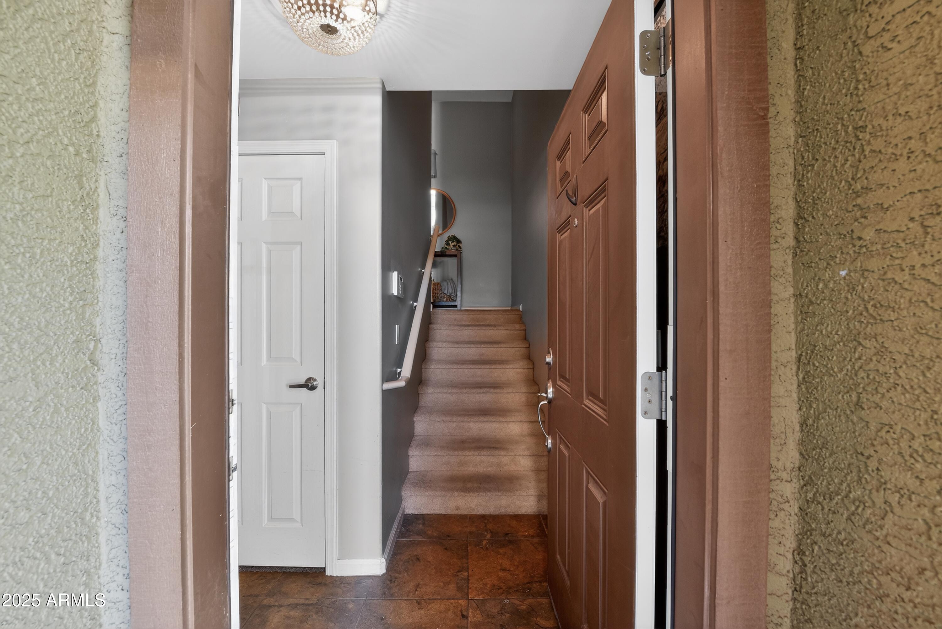 1920 East Bell Road, Unit 1079 Phoenix, AZ 85022 - Photo 7 of 29 a view of a hallway with stairs