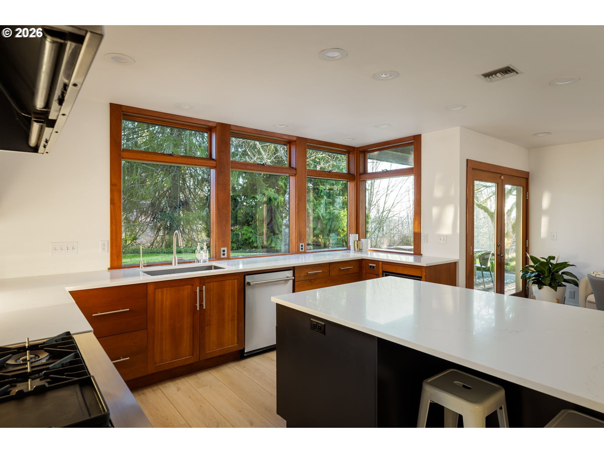 400 Northwest Miller Road Portland, OR 97229 - Photo 15 of 48 a dining room with a large window and table