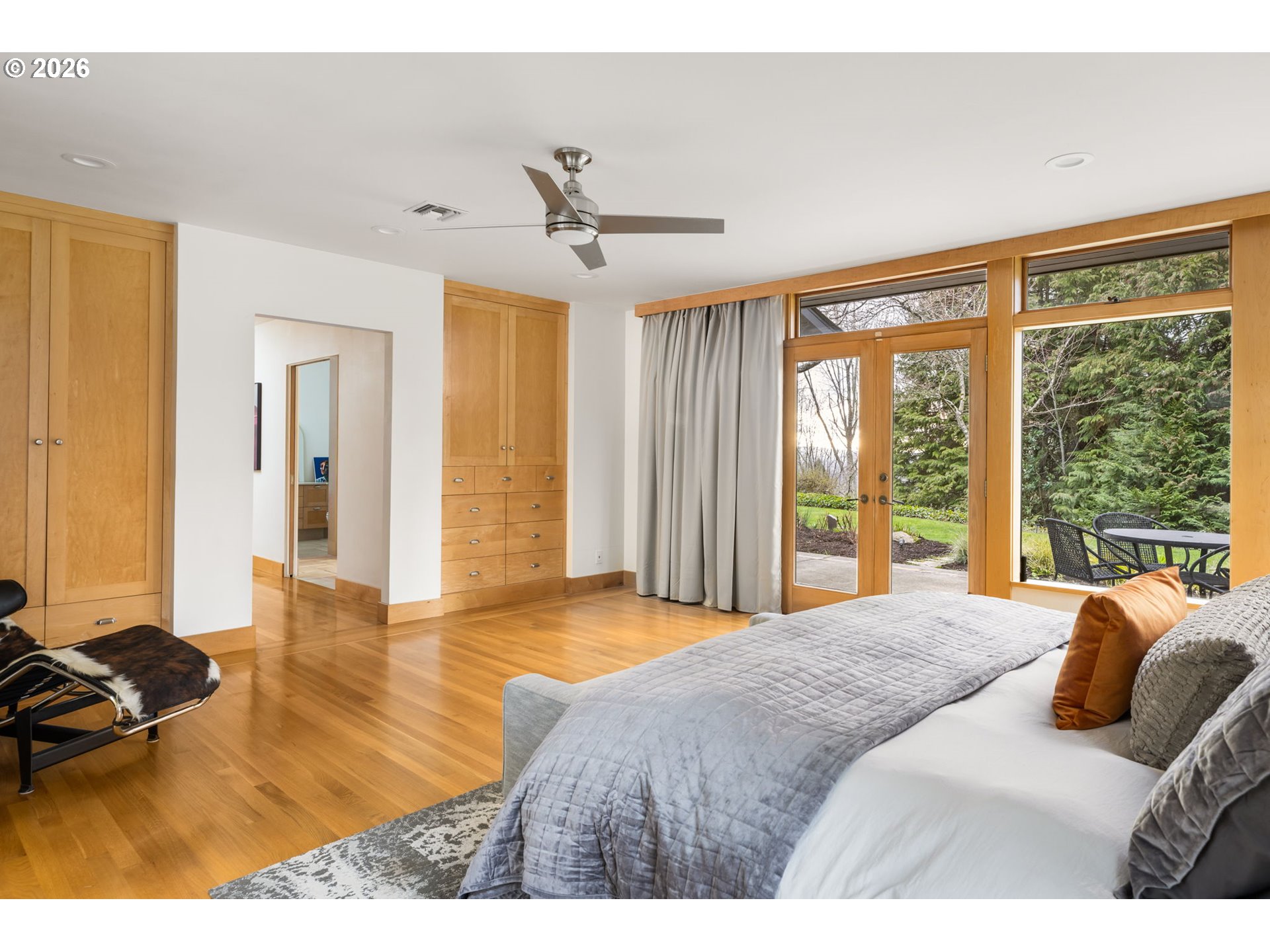 400 Northwest Miller Road Portland, OR 97229 - Photo 21 of 48 a bedroom with a bed and a large window