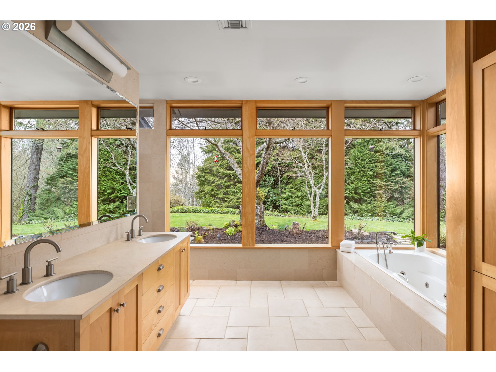 400 Northwest Miller Road Portland, OR 97229 - Photo 23 of 48 a large bathroom with a large tub and sink