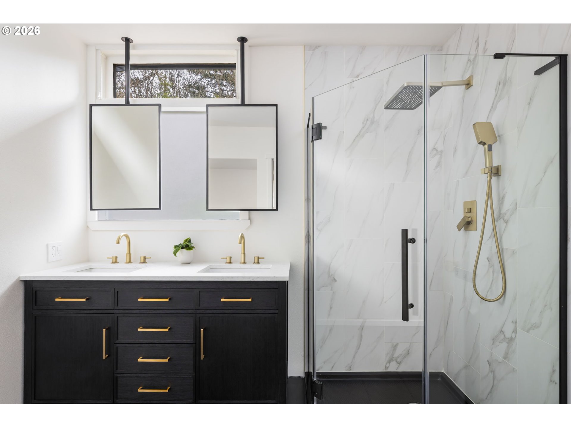 400 Northwest Miller Road Portland, OR 97229 - Photo 27 of 48 a bathroom with a double vanity sink a mirror and shower