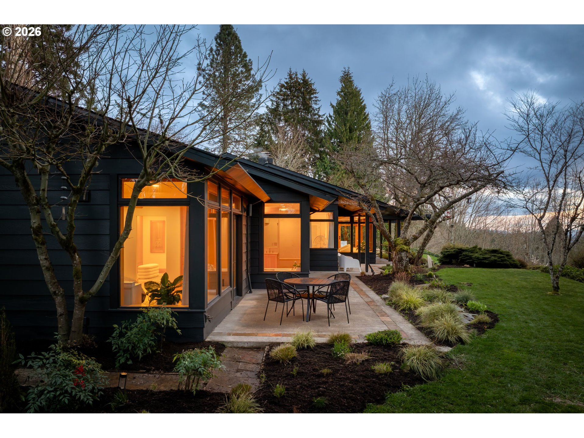 400 Northwest Miller Road Portland, OR 97229 - Photo 40 of 48 a backyard of a house with table and chairs