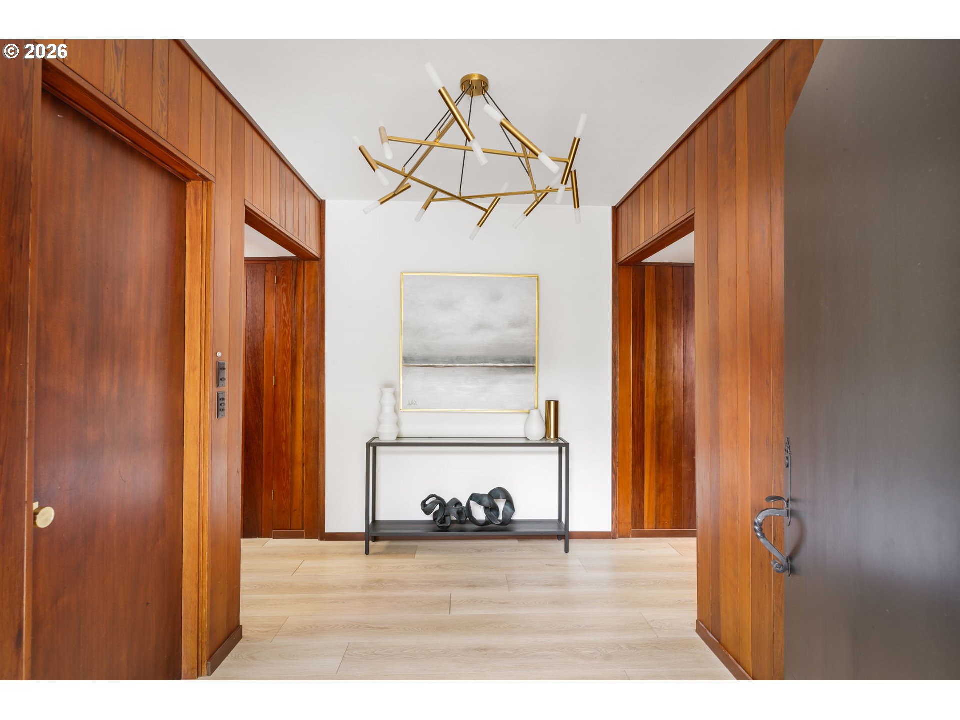 400 Northwest Miller Road Portland, OR 97229 - Photo 4 of 48 a view of a room with wooden floor and windows