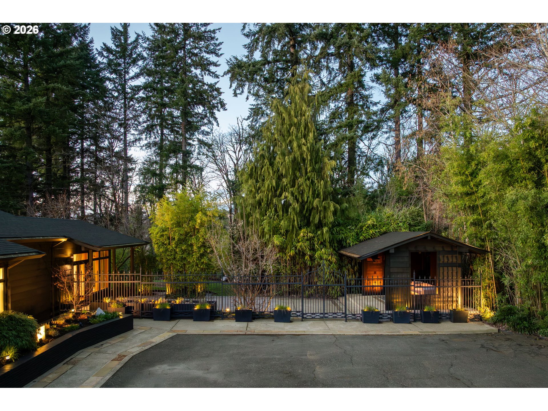 400 Northwest Miller Road Portland, OR 97229 - Photo 44 of 48 a view of a yard in front of a house with large trees