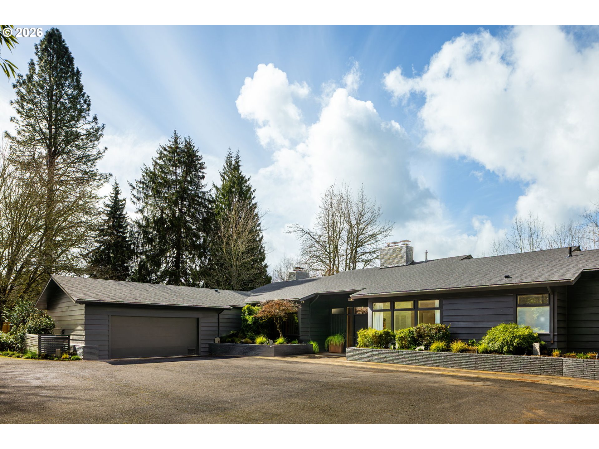 400 Northwest Miller Road Portland, OR 97229 - Photo 45 of 48 a front view of a house with a garden