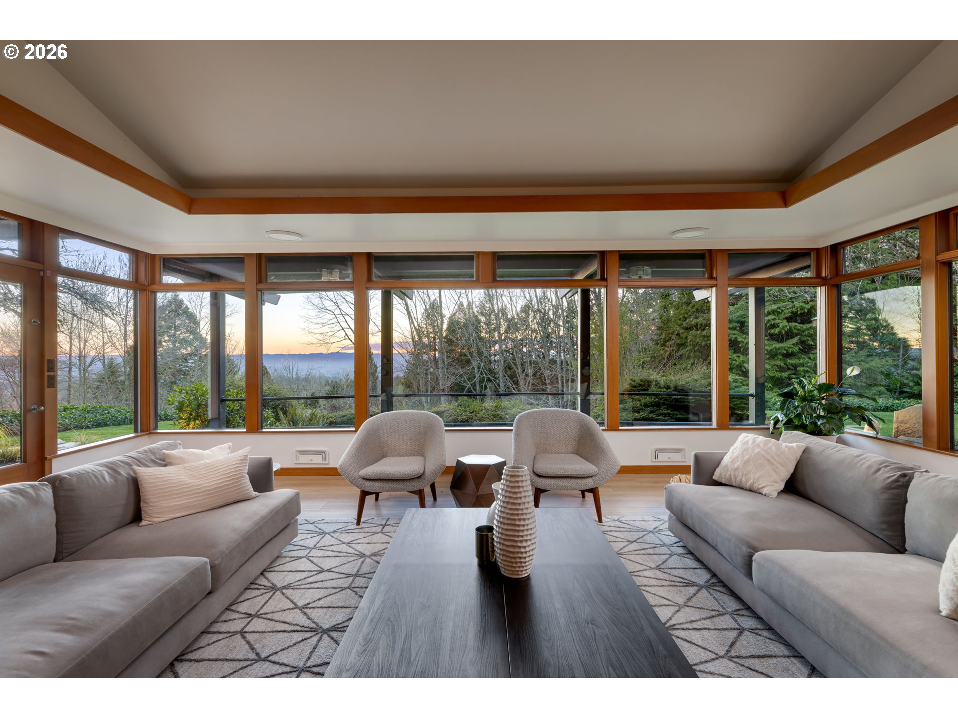 400 Northwest Miller Road Portland, OR 97229 - Photo 5 of 48 a living room with furniture and large windows