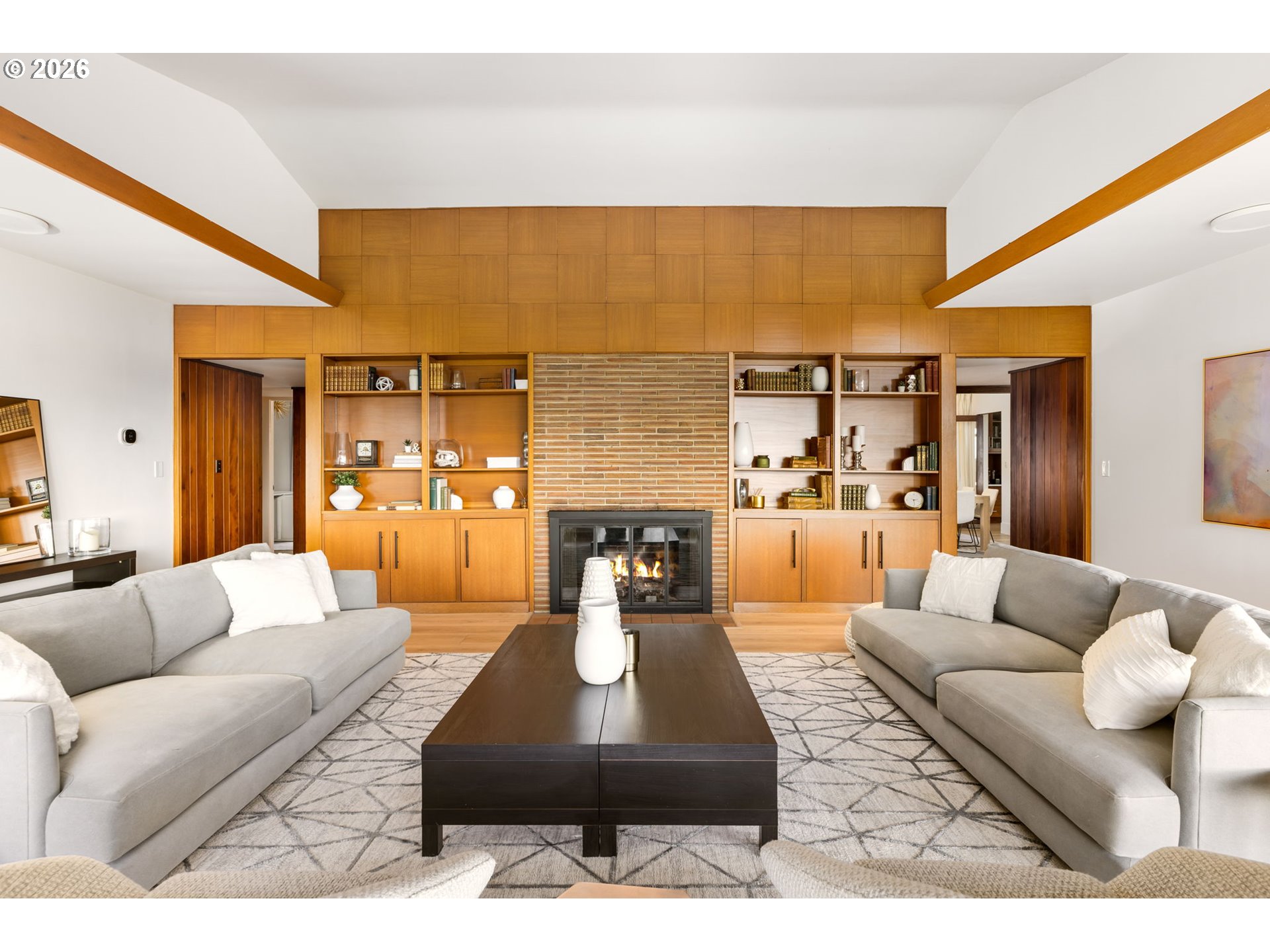 400 Northwest Miller Road Portland, OR 97229 - Photo 6 of 48 a living room with furniture and a fireplace