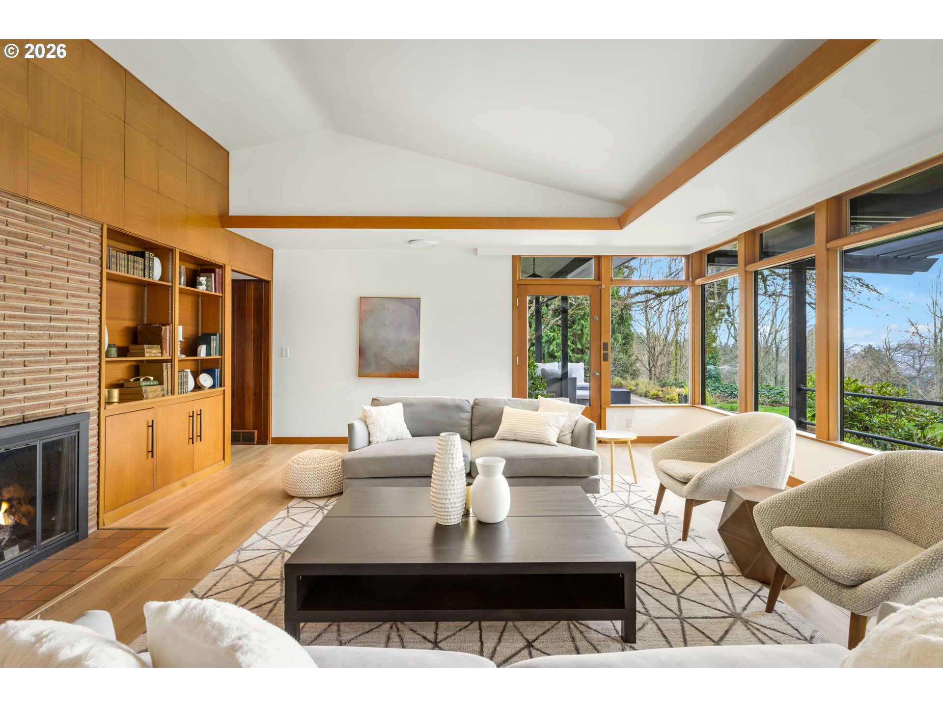 400 Northwest Miller Road Portland, OR 97229 - Photo 7 of 48 a living room with furniture and large windows