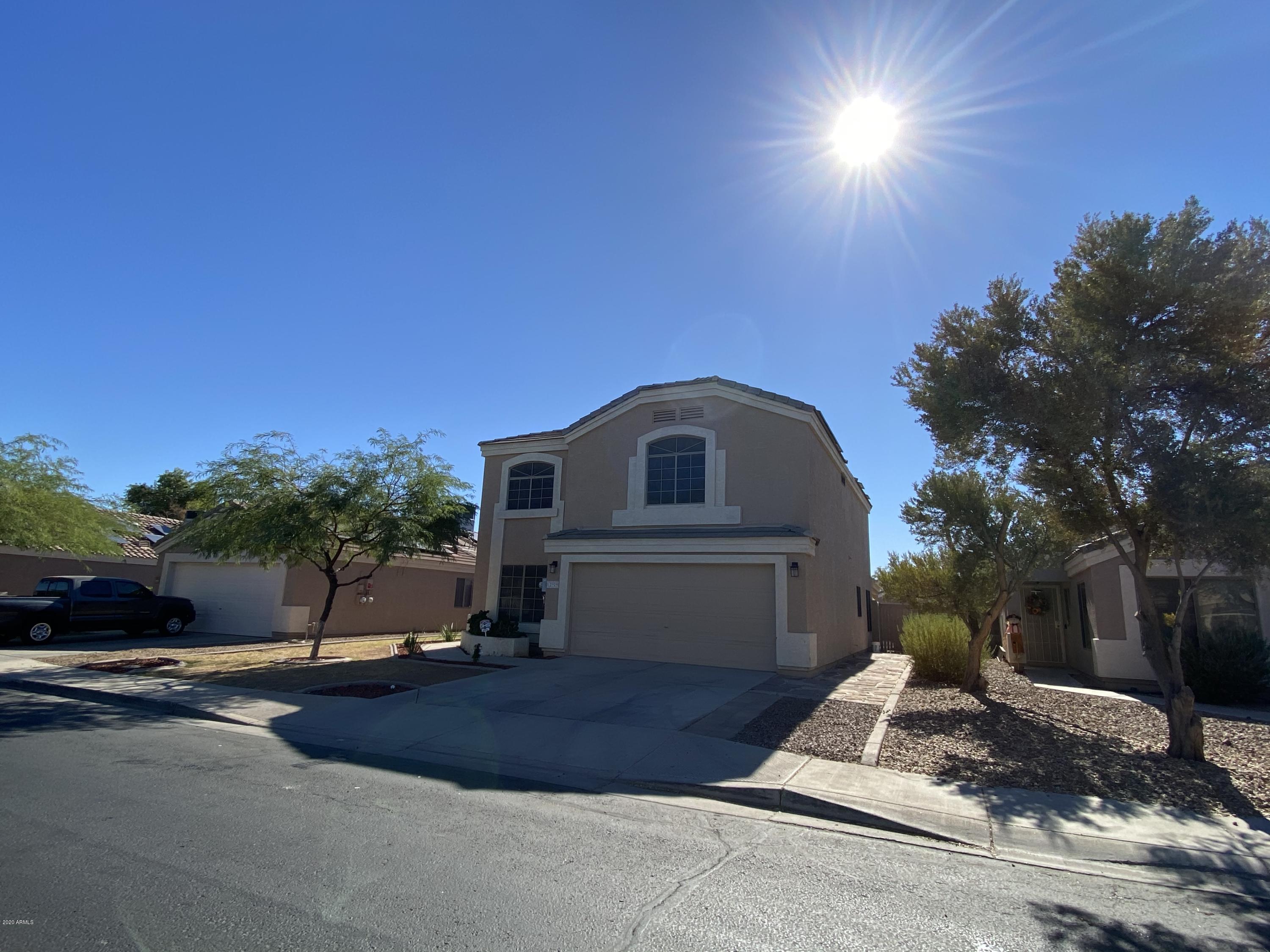 12929 West Hearn Road El Mirage, AZ 85335 - Photo 2 of 12 35DC0AA8-DEE6-4A39-B500-C4C81643657E