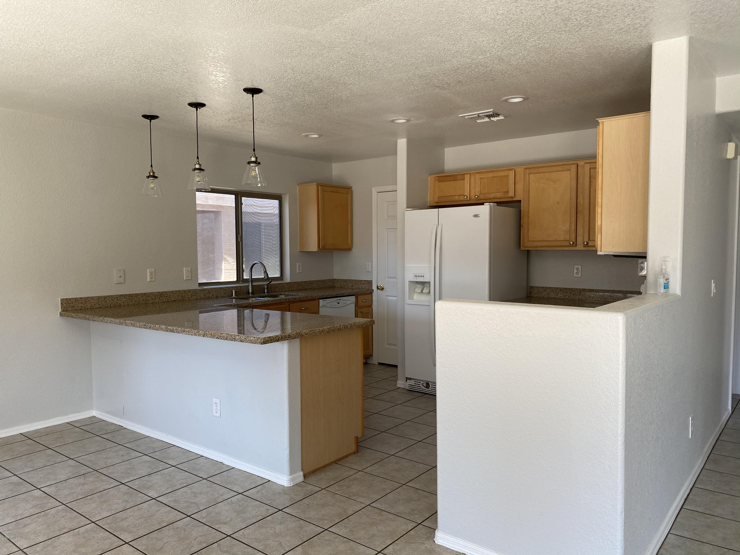 12929 West Hearn Road El Mirage, AZ 85335 - Photo 4 of 12 1143D734-6388-42B9-9370-A7913A535864