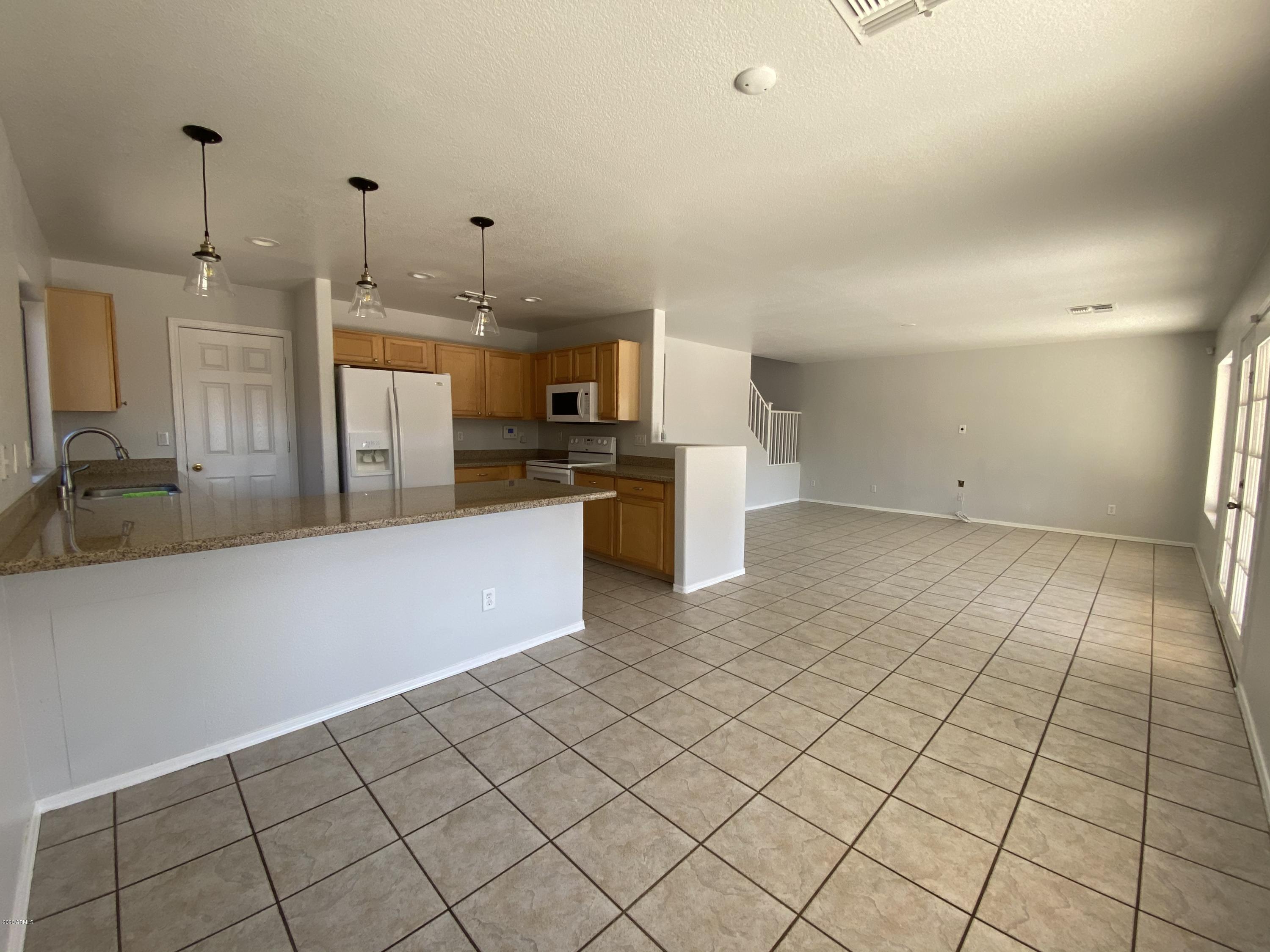 12929 West Hearn Road El Mirage, AZ 85335 - Photo 6 of 12 94F28C10-9E5F-48C1-AFED-F4D044371E60