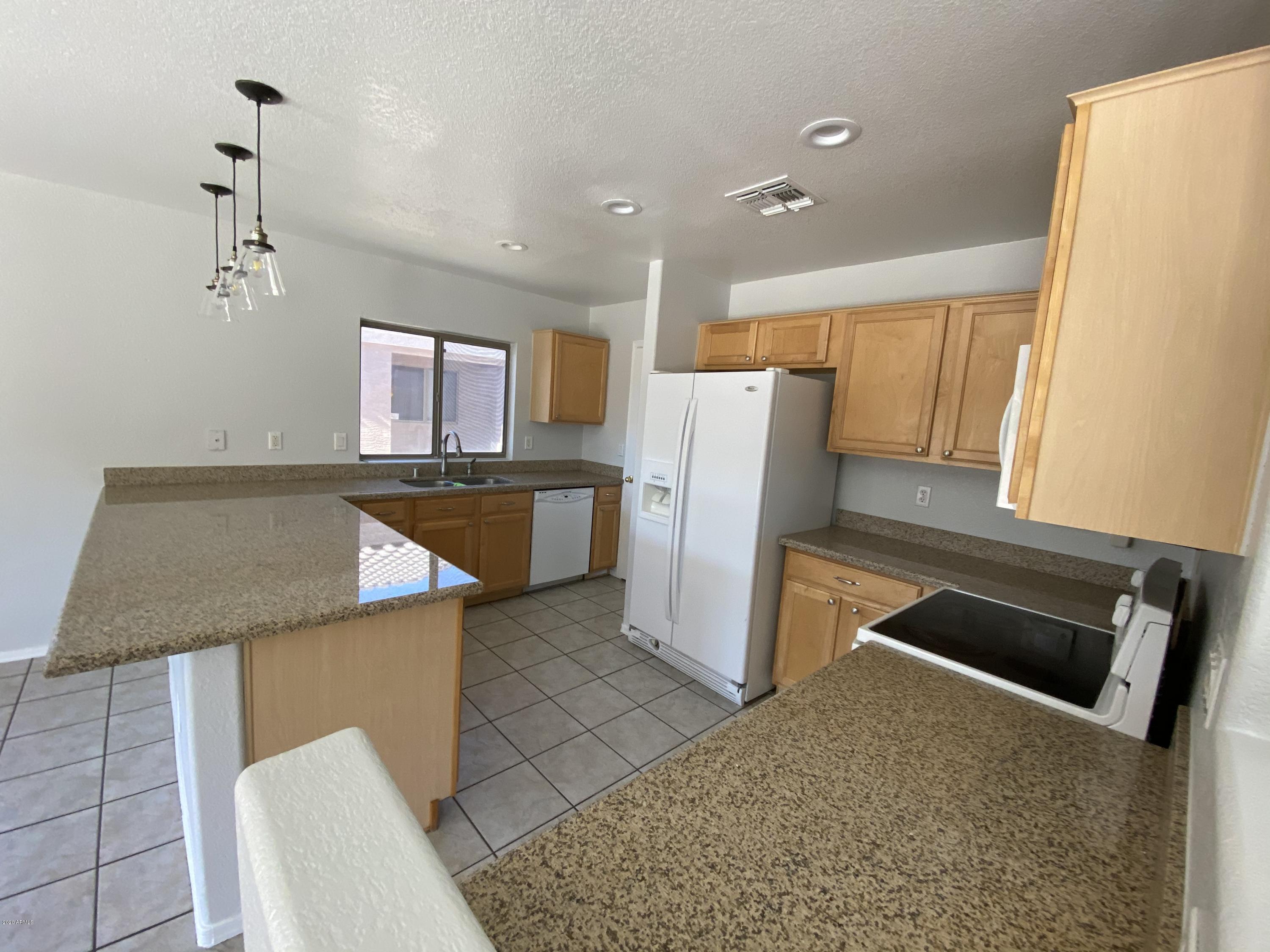 12929 West Hearn Road El Mirage, AZ 85335 - Photo 8 of 12 9CC5ED7B-BCE1-4F2D-9330-9696929E4B82