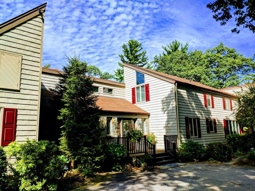 101 Vinton Road Holland, MA 01521 - Photo 1 of 42 a front view of a house with garden
