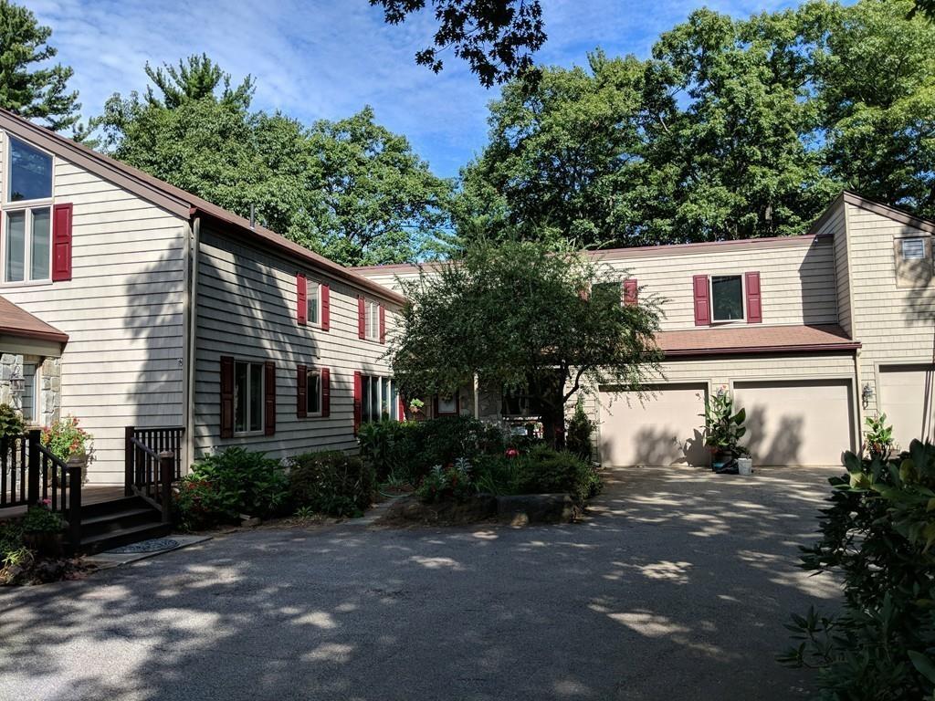 101 Vinton Road Holland, MA 01521 - Photo 11 of 42 a house that has a tree in front of the house