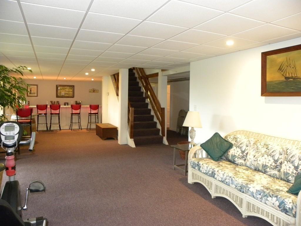 101 Vinton Road Holland, MA 01521 - Photo 13 of 42 a view of a livingroom with furniture and staircase