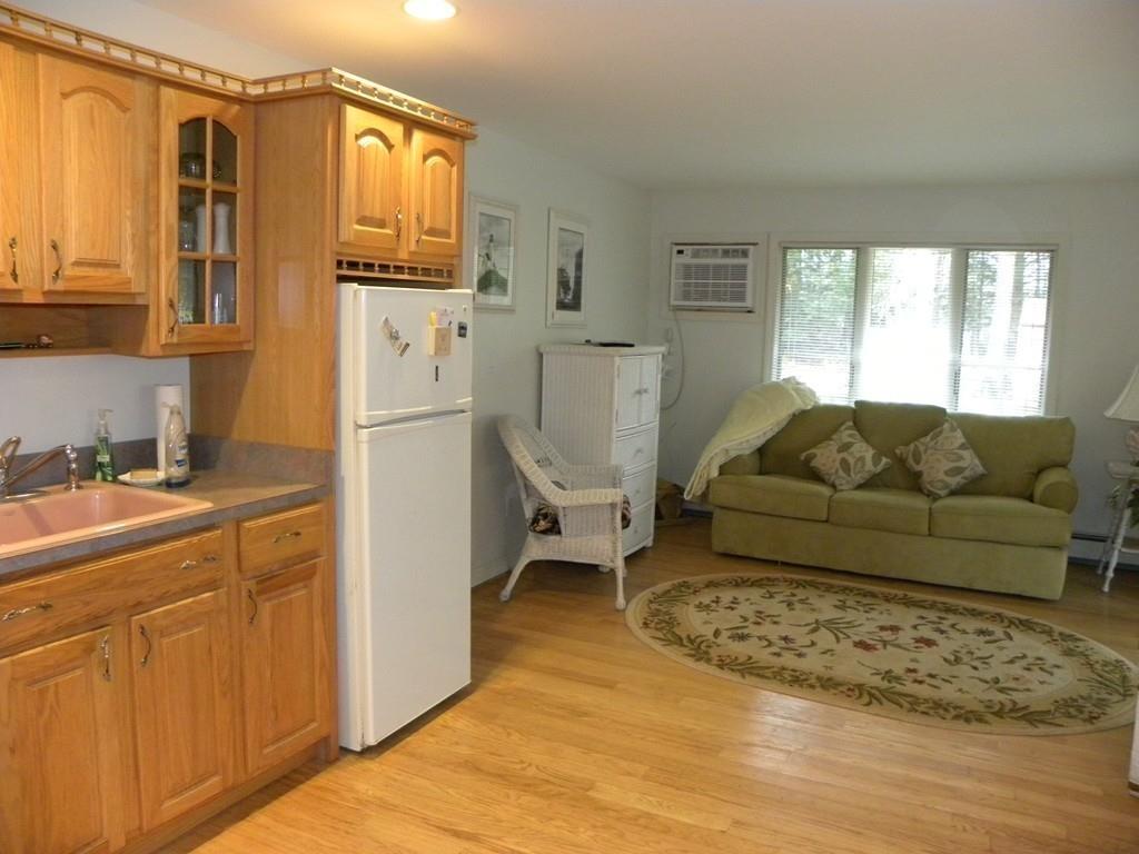 101 Vinton Road Holland, MA 01521 - Photo 15 of 42 a living room with furniture a flat screen tv and a window