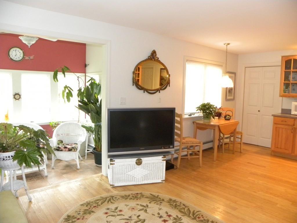 101 Vinton Road Holland, MA 01521 - Photo 16 of 42 a living room with furniture and a flat screen tv