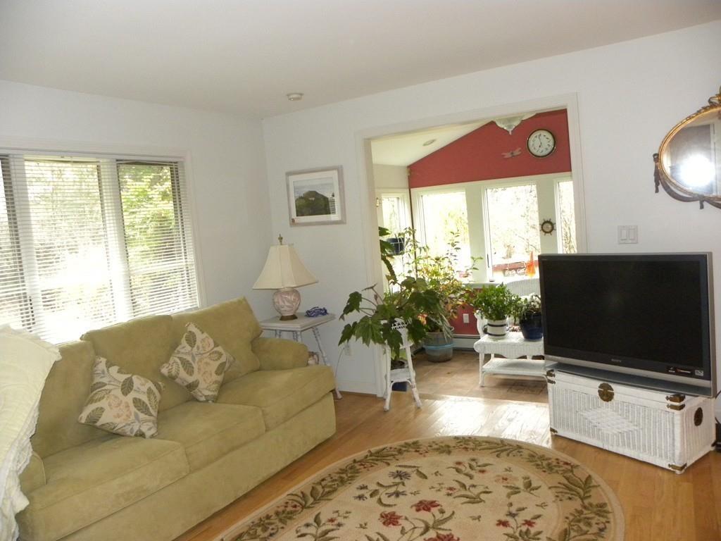 101 Vinton Road Holland, MA 01521 - Photo 17 of 42 a living room with furniture and a flat screen tv