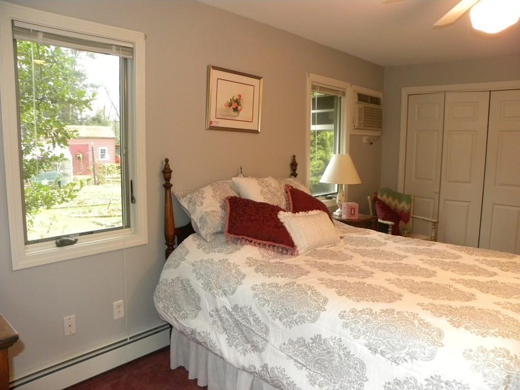 101 Vinton Road Holland, MA 01521 - Photo 19 of 42 a bedroom with a bed and a window