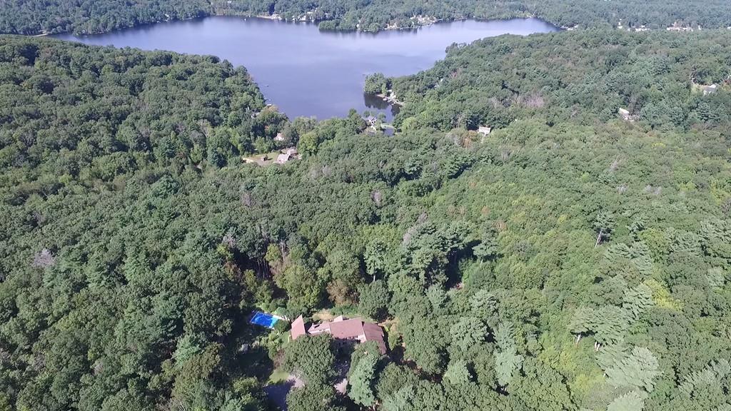 101 Vinton Road Holland, MA 01521 - Photo 2 of 42 a view of a lush green field