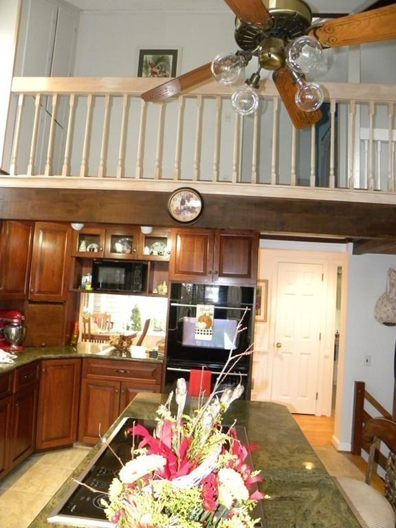 101 Vinton Road Holland, MA 01521 - Photo 25 of 42 a view of entryway with a dining table chairs and chandelier