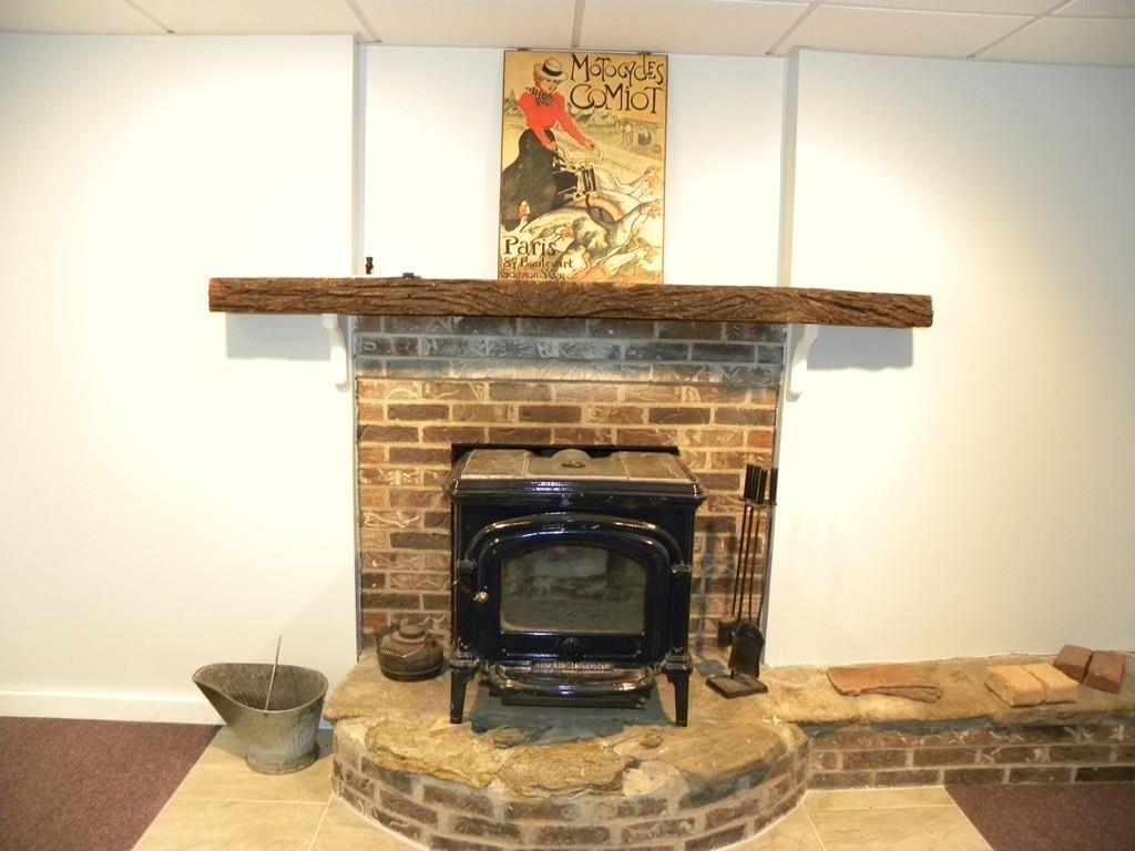 101 Vinton Road Holland, MA 01521 - Photo 29 of 42 a close view of a fireplace in a room